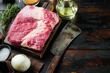 Point brisket, raw beef brisket meat,with ingredients for smoking  making  barbecue, pastrami,...