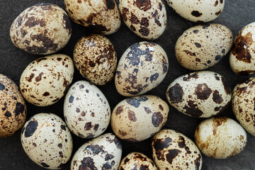 Group of quail eggs as a background. Raw eggs.