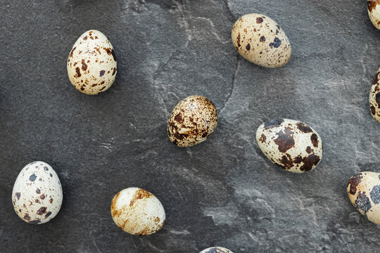 Background with small quail eggs