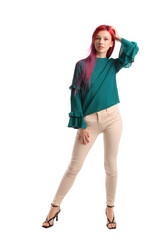 Beautiful young woman with bright hair on white background