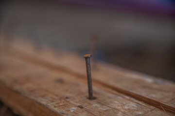 rusty nail in wood