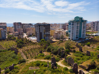 Aerial view of remains of Naula Ancient City located in center of Mahmutlar, district of Alanya, Turkey.