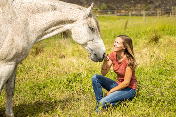 White Lusitano horse, friendship with woman, amazing connection.
