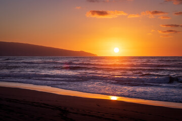 Naklejka premium Sunset at beach, Sao Miguel island, Azores, Portugal vacation.