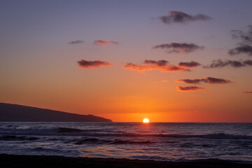 Sunset at beach, Sao Miguel island, Azores, Portugal vacation.