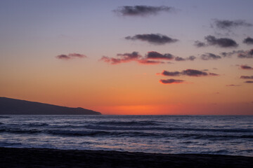 Fototapeta na wymiar Sunset at beach, Sao Miguel island, Azores, Portugal vacation.
