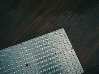 Wooden deck with tactile paving