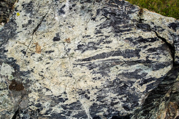 Stones. Rock background. Large stones and grass. Abstract natural background. Nature. Stone texture