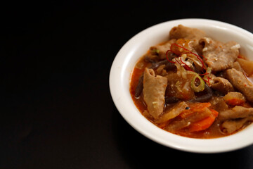 Japanese cuisine motsuni with internal organs simmered on the table