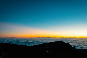 A view of the sunrise from the Haleakala volcano on the island of Maui, Hawaii.
