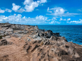 Fototapeta na wymiar Sharp rocks on the coast of Maui, Hawaii.
