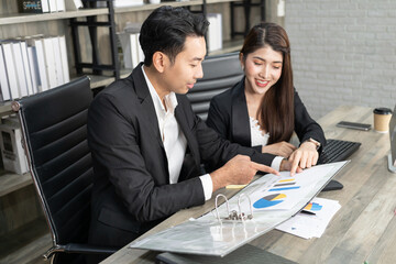 Business Corporate team brainstorming, Planning Strategy having a discussion Analysis investment researching with chart at office. Business meeting concept