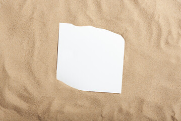 Summer layout, flat lay minimal design of beach sand with a blank paper card