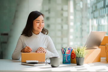 start a small business SME business owners, successful female entrepreneurs Work with laptops with...