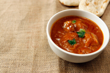 Indian chicken curry roux like tomato soup on the table