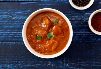 Indian chicken curry roux like tomato soup on the table