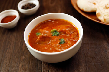 Indian chicken curry roux like tomato soup on the table