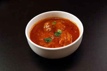 Indian chicken curry roux like tomato soup on the table