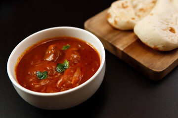 Indian chicken curry roux like tomato soup on the table