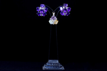 Women's earrings and accessories that has been decorated on a black screen