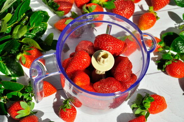 Ripe strawberries in a blender.