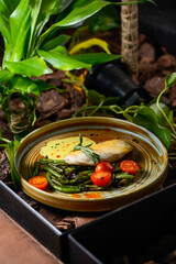 chicken fillet with asparagus and tomatoes