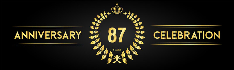 87 years anniversary celebration logo with laurel wreath and royal crown isolated on black background. Premium design for happy birthday, wedding, celebration events, greetings card, graduation.