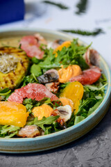 fresh salad with avocado and citrus macro photo