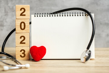 2023 Happy New Year for healthcare, Insurance, Wellness and medical concept. Stethoscope and blank...