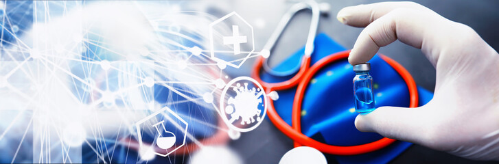 Abstract medical theme background. Health care concept. EU flag and stethoscope on a gray...