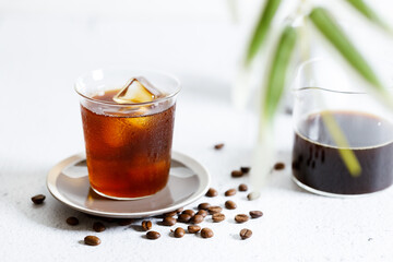 Iced Coffee on white marble table.