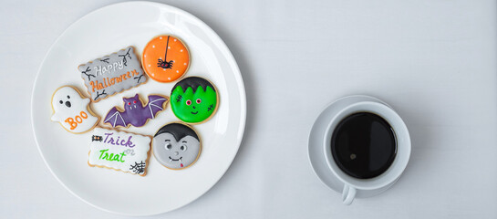 hot coffee cup with funny Halloween Cookies. Happy Halloween day, Trick or Threat, Hello October, fall autumn, Traditional, party and holiday concept
