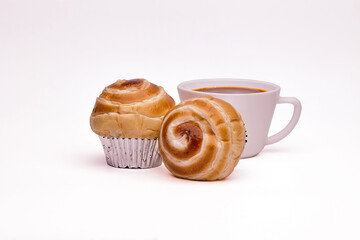 Mini cruffin(croissant and muffin) with cup of coffee. Close up of  Cruffin in white background.