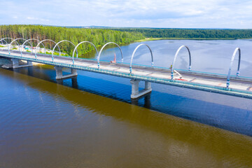 Construction of an automobile bridge across the river. View from above