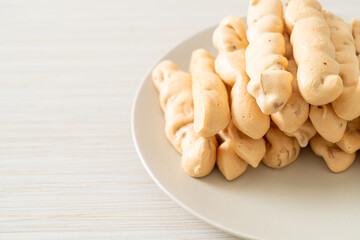 almonds meringue stick on plate