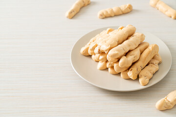 almonds meringue stick on plate