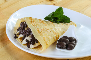 Pancake with banana and chocolate