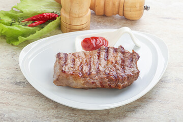 Grilled rib-eye steak beef meat