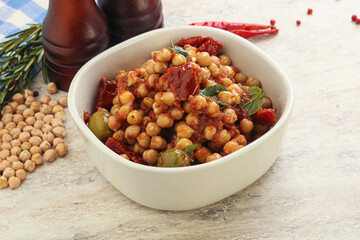 Chickpea beans with dry tomato and olives