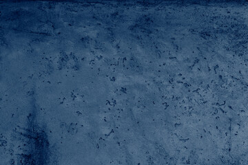 Blue concrete or cement material in abstract wall background texture.