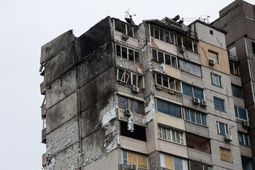 KYIV, UKRAINE - APR 21, 2022: The rooftop and apartments of an apartment building on Poznyaky was destroyed by the Kalibr cruise missile at the 17 march of the full-scale Russian invasion of Ukraine