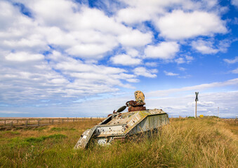 Abandoned armoured personnel carrier APC on Romney Marsh between Lydd and Dungeness Kent south east England