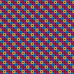 Seamless background with small multicolored rings.