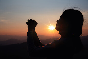 woman worship on sunset