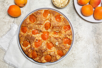 German Apricot Cake with almonds and  fresh fruits. Top view.