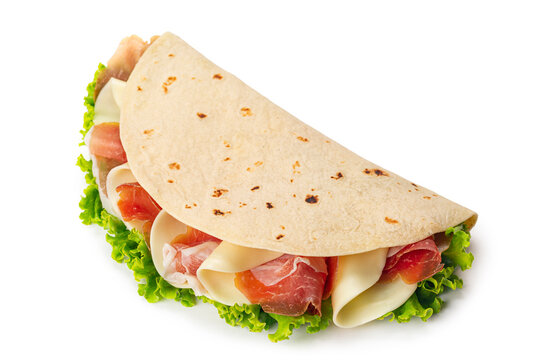 Piadina romagnola, traditional italian flatbread wrap with prosciutto crudo di Parma - italian dry cured ham, mozzarella cheese and lettuce. White background.