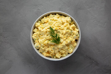 Homemade Egg Salad with Dill in a Bowl, top view. Flat lay, overhead, from above.