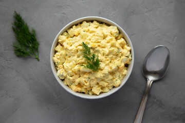 Homemade Egg Salad with Dill in a Bowl, top view. Flat lay, overhead, from above.