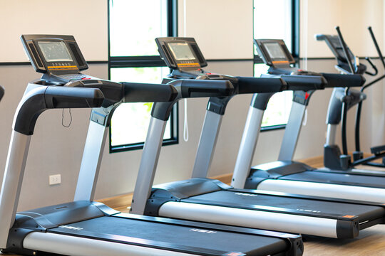 Gym exercise equipments treadmill handle in modern fitness center for people exercise workout room.