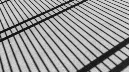 Graphic shapes - parallel shadow lines on floor High contrast.